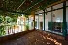 Mit Pergola beschattete Terrasse
