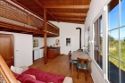 Studio Wohn-, Koch- und Essbereich mit Schlafempore