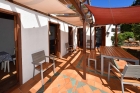 Haupthaus teil�berdachte Terrasse