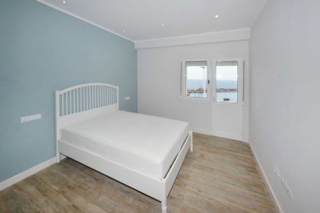  Schlafzimmer 1 mit Balkon und Meerblick